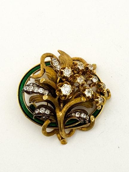 Broche-pendentif en or 18K (750 millièmes) représe
