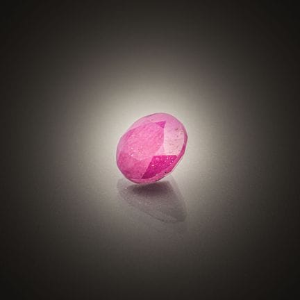 Round ruby on paper.
Weight: 2.12 carats.