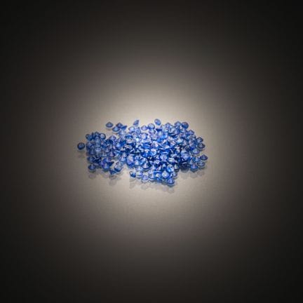 Lot of round sapphires on paper.
Approximately 240