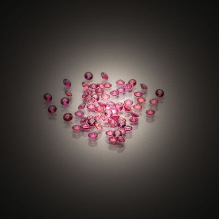 Set of round rubies on paper.
Approximately 65 pie