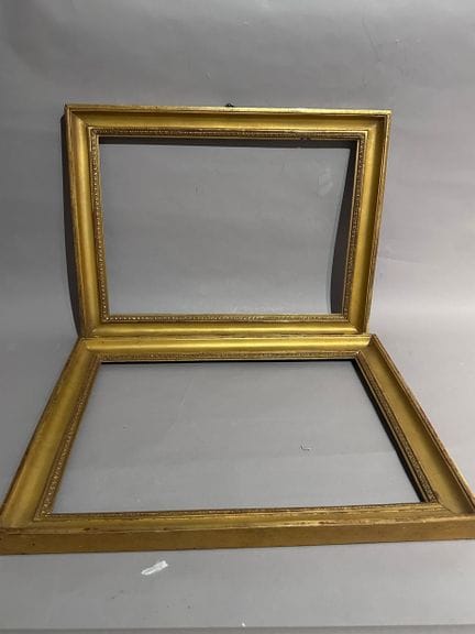 Two wooden frames with stucco and gilding, decorat