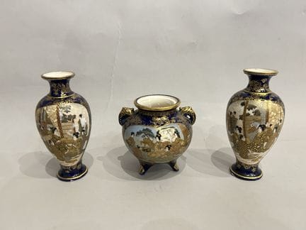 JAPAN
Two small baluster vases and a tripod vase m