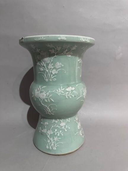 CHINA
White-glazed porcelain baluster vase with fl