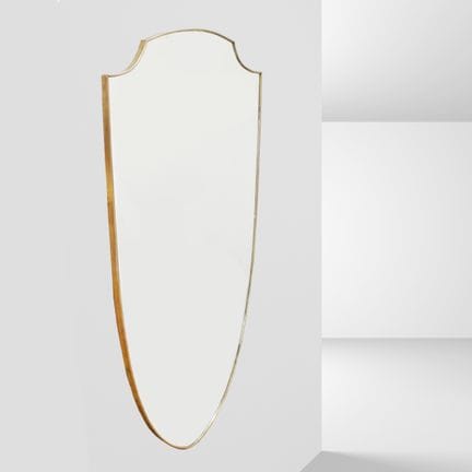 Gio Ponti, a 133x73 cm wall mirror in brass and mi