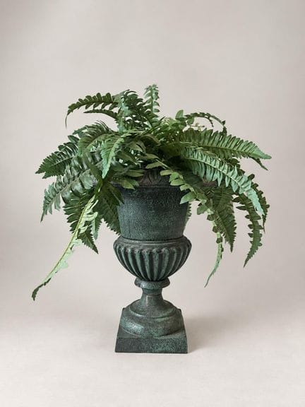 Medici vase made of cast iron with an antique gree