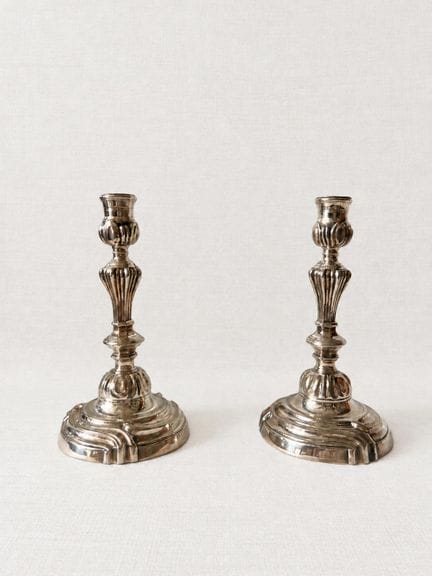 Pair of Transition-style candlesticks in silver-pl