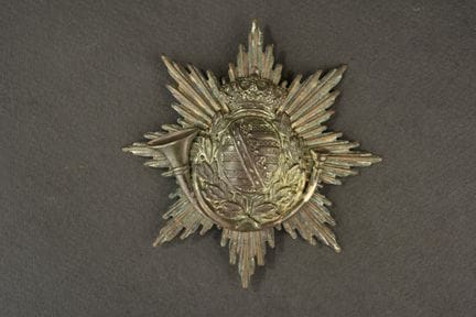 Piastra di shako sassone recuperata sul campo di b