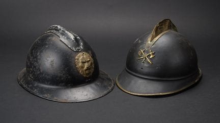 Belgium, set of two Adrian firefighter helmets. On
