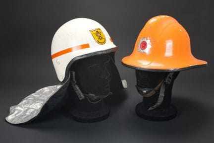 Denmark, set of two firefighter helmets. A white h