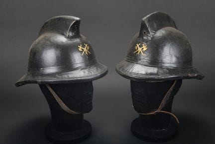 Belgium, set of two Brussels firefighter helmets. 