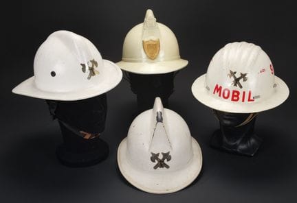 Belgium, set of four firefighter helmets from the 