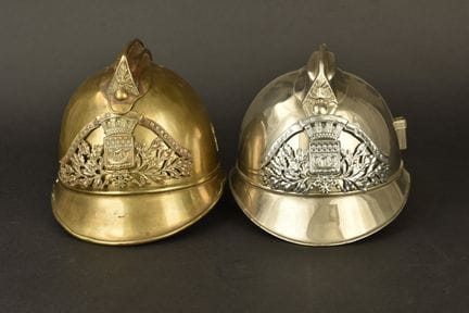 France, set of two Paris firefighter helmets. A 19