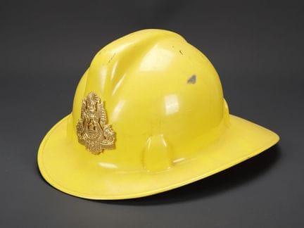 Cambodia, firefighter helmet. Yellow helmet manufa