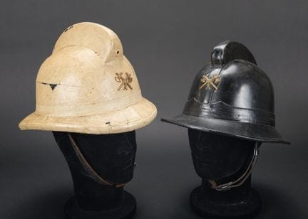 Belgium, set of two Brussels firefighter helmets. 