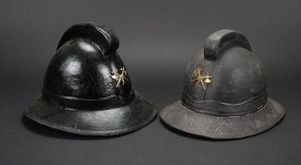 Belgium, set of two Brussels firefighter helmets. 