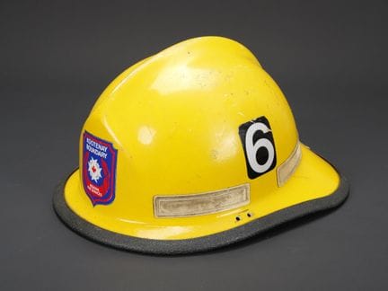 Canada, Kootenay firefighter helmet. Yellow Cairns