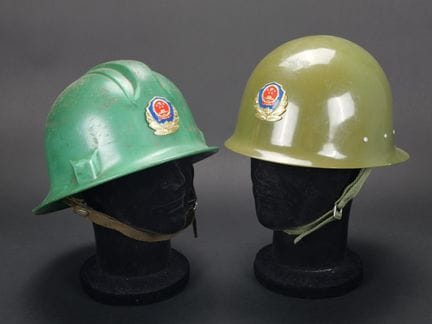 China, set of two firefighter or civil defense hel