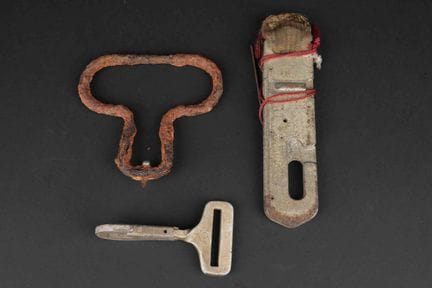 U.S. parachute buckles from Normandy. Includes a m