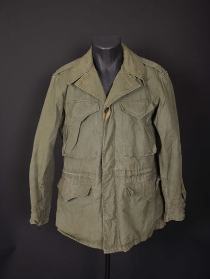 US M43 jacket. Made of khaki canvas. Some buttons 