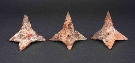 Flat tires. Three metal pieces. From an excavation