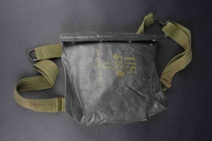US assault gas mask bag. Made of black rubberized 