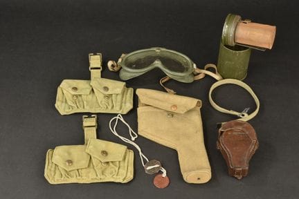 British equipment. Includes a pair of dog tags, il