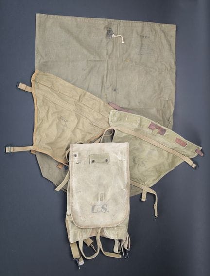 U.S. equipment. Includes a khaki waterproof canvas