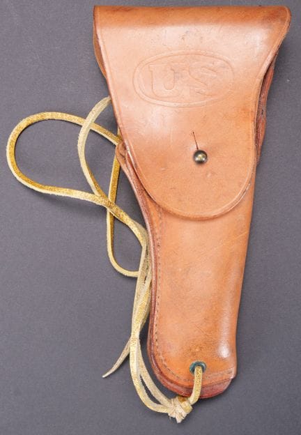 Holster for a Colt .45 pistol. Made of tan leather