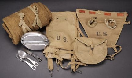 U.S. equipment. Includes an M1928 triangle bag mad