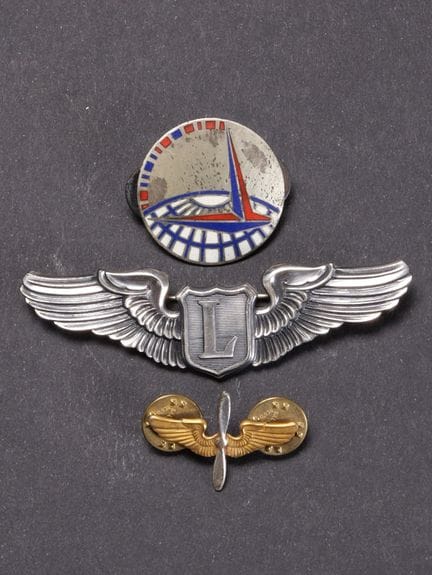 USAAF Badge. Includes a silver-colored metal badge