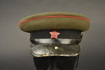 Russian officer's cap. Made of brown cloth. Red tr