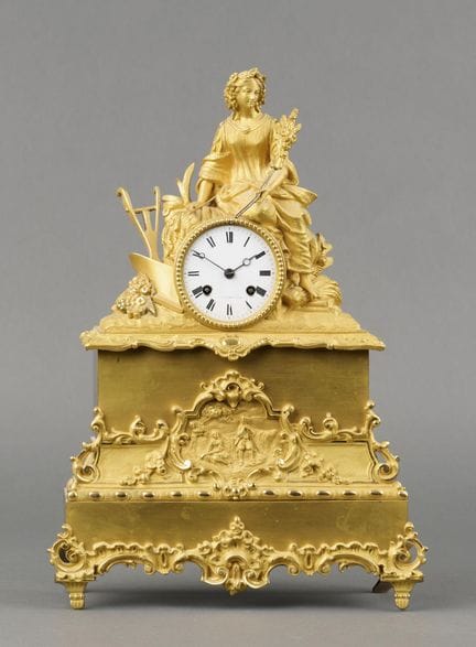 Important gilded bronze agricultural CLOCK; the lo