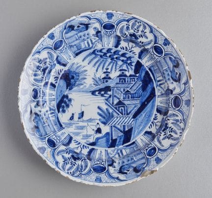 Plato de loza de Delft con un pescador de estilo c