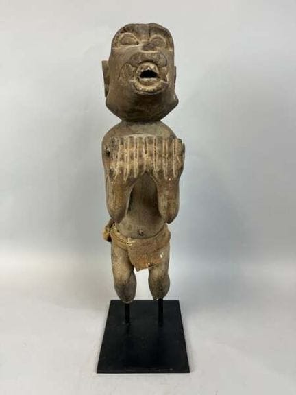 Estatuilla también conocida como «mono mendigo» de
