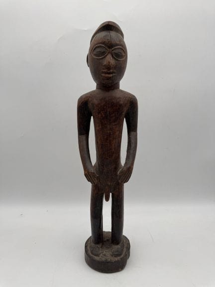 STATUETTE MASCULINE
Milieu du XXe siècle. Bois à p