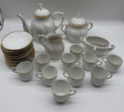 Juego de café y té de porcelana blanca con ribetes