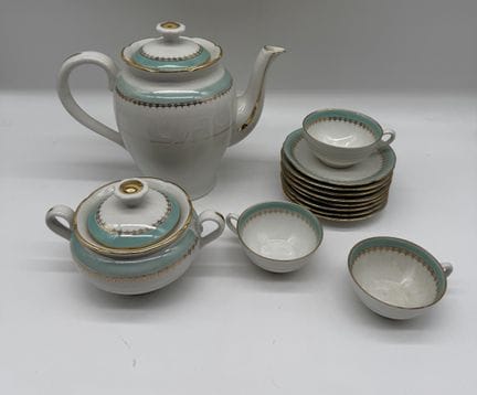 Juego de té/café de porcelana esmaltada con ribete