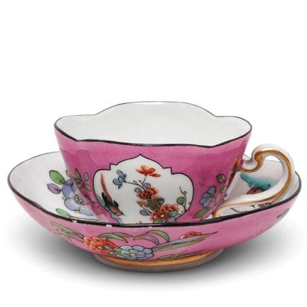 Tasse à thé et soucoupe anciennes en porcelaine de