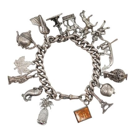 Bracciale vintage con ciondoli figurativi in argen