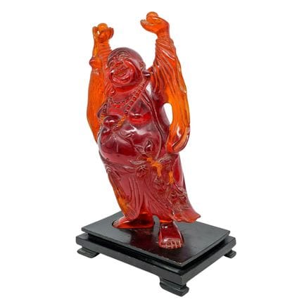 Grand Bouddha rieur chinois en résine ambrée sur s