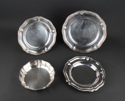 Set of two round serving platters, contoured desig