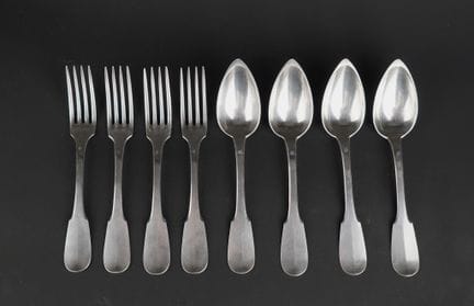 Set of four pieces of flatware (forks and spoons) 