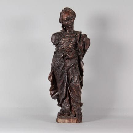 Sainte en bois léger sculpté à patine brune – XVII