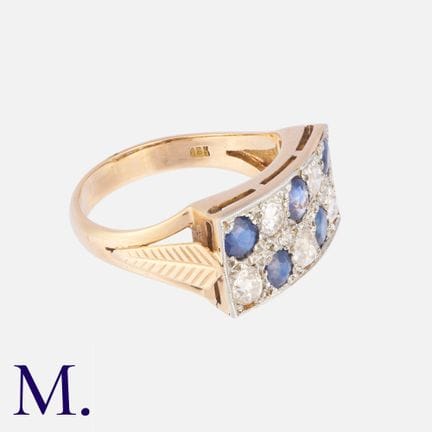 Bague en or jaune sertie de saphirs et de diamants