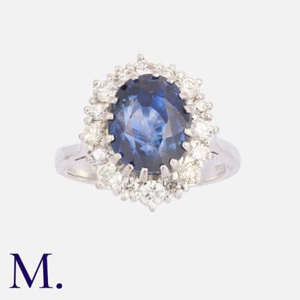 Bague en or 18 carats sertie d'un saphir et de dia