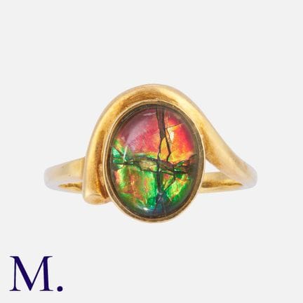Bague en or jaune 18 carats, sertie d'une pierre p