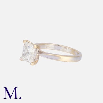 Bague solitaire en or 18 carats, sertie d'un diama
