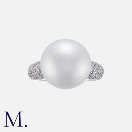 Bague en or blanc 18 carats sertie d'une perle d'e