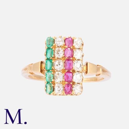 Bague en or jaune 18 carats sertie de rubis, de di