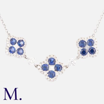 Collier en or blanc 18 carats, orné de saphirs et 